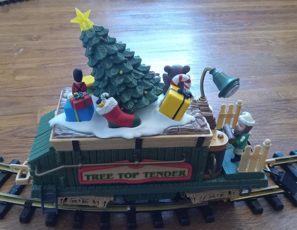 The Holiday Express Animated Train Set. Complete working set plus 2 extra cars.