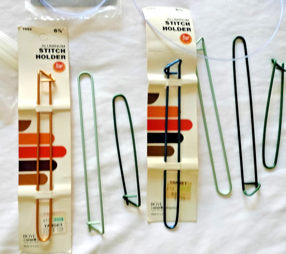 2 circluar knitting needles & 9 stitch holders