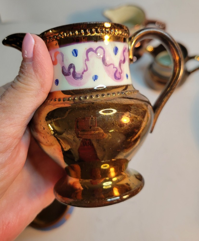 4 Pieces of Copper Lusterware 3 Small Pitchers & 1 Salt Cellar