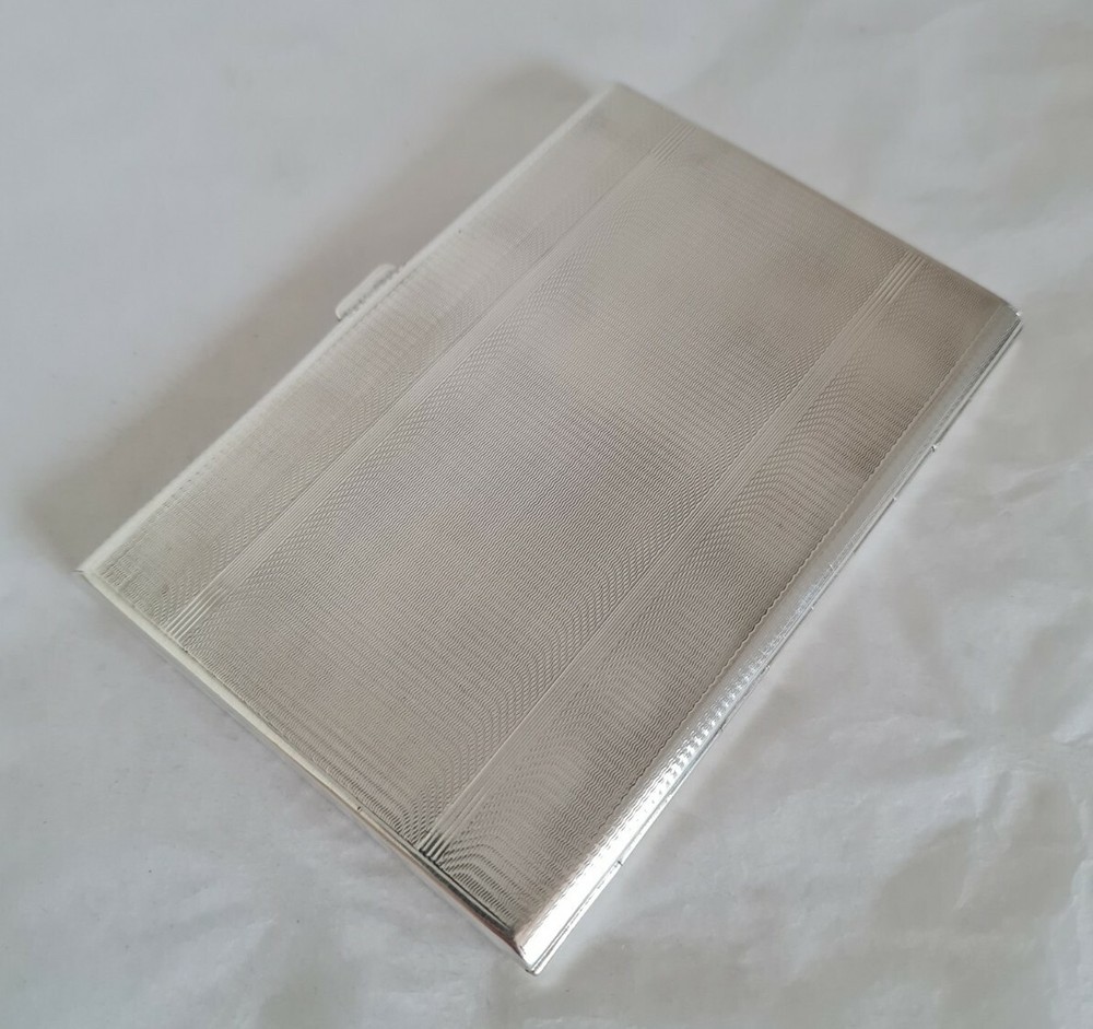 Antique sterling silver cigarette case. Engine turned decoration.Birmingham 1939