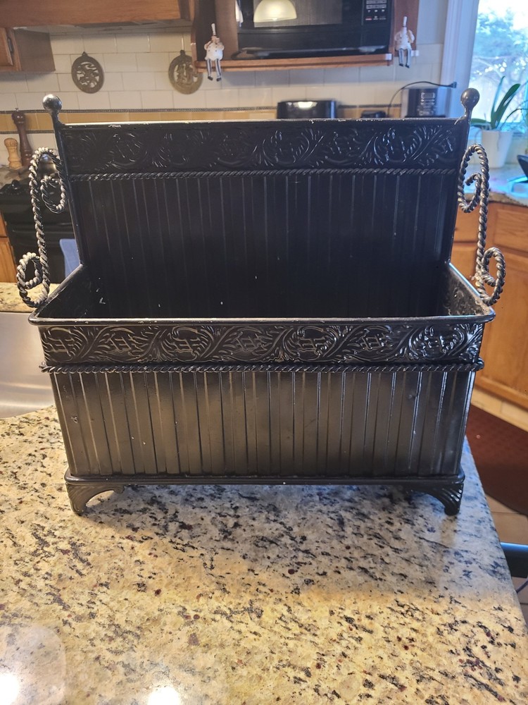 antique cast iron fireplace log holder basket. It is a decorative piece