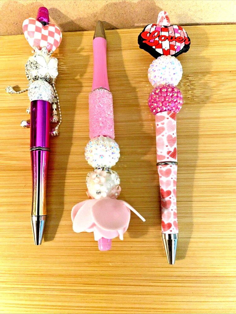 3 miscellaneous beaded pens with 1 ink refill each