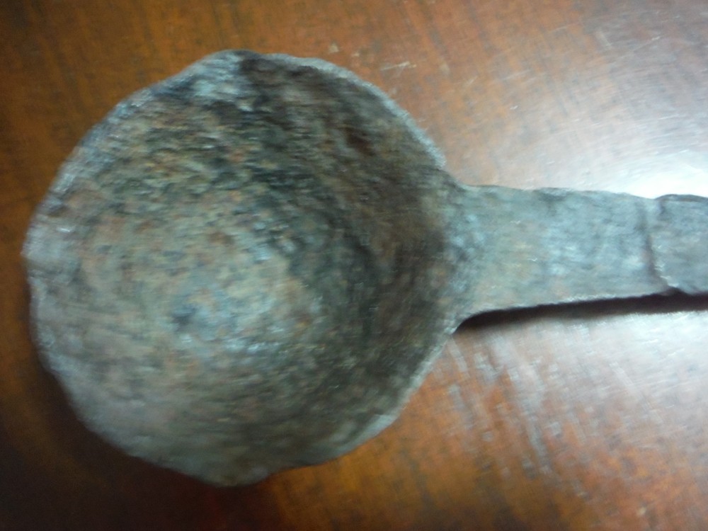 vintage huge metal spoon
