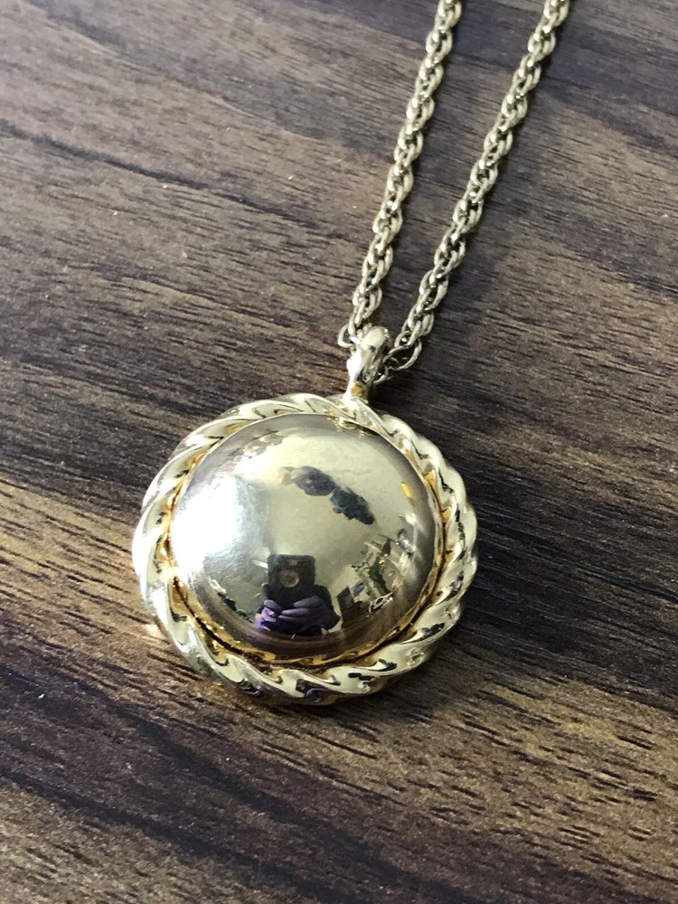 Monet Gold tone Necklace with round Pattern Pendant