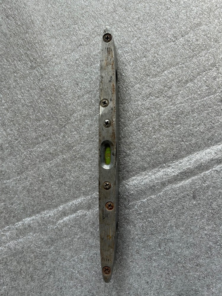 Vintage level, 2” micrometer, and divider caliper