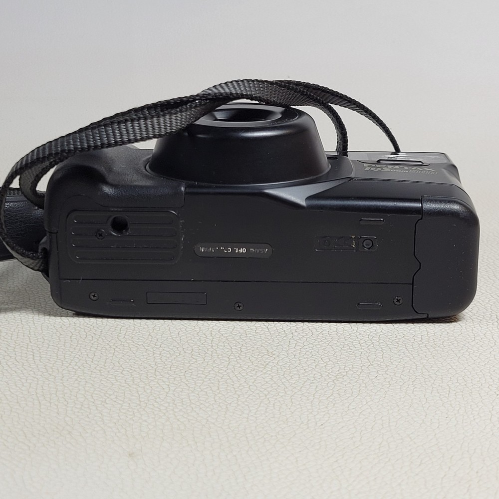 Pentax 900 35mm Autofocus With Strap...UNTESTED