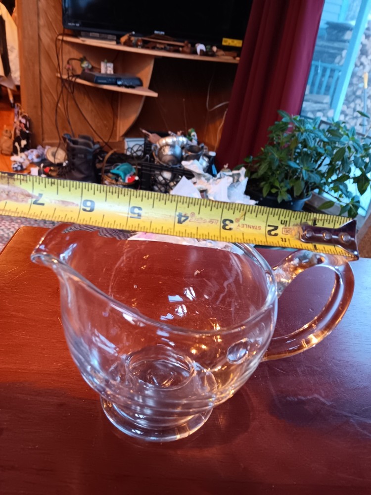 HAND BLOWN GLASS PITCHER. 1309