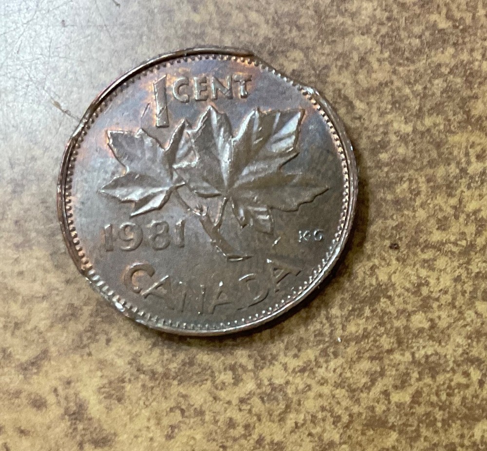 Canada 1981 cent bronze QE2 clipped planchet error curved CLIPS