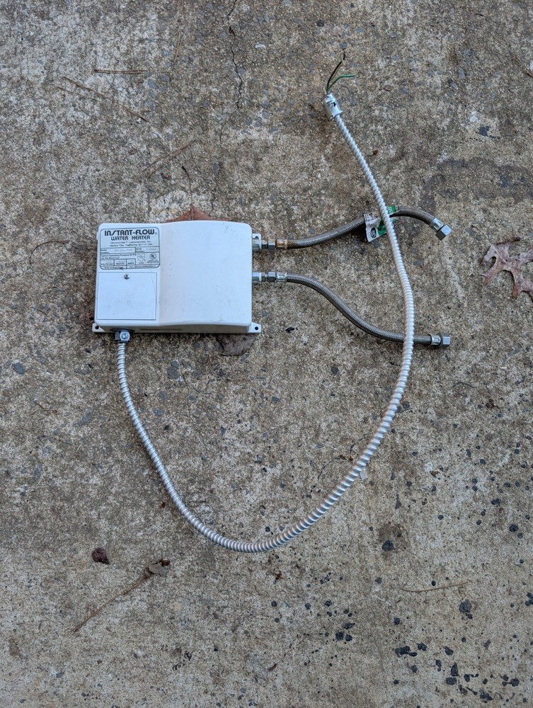 Used tankless Instant Flo Hot Water Heater With All Connections 220v