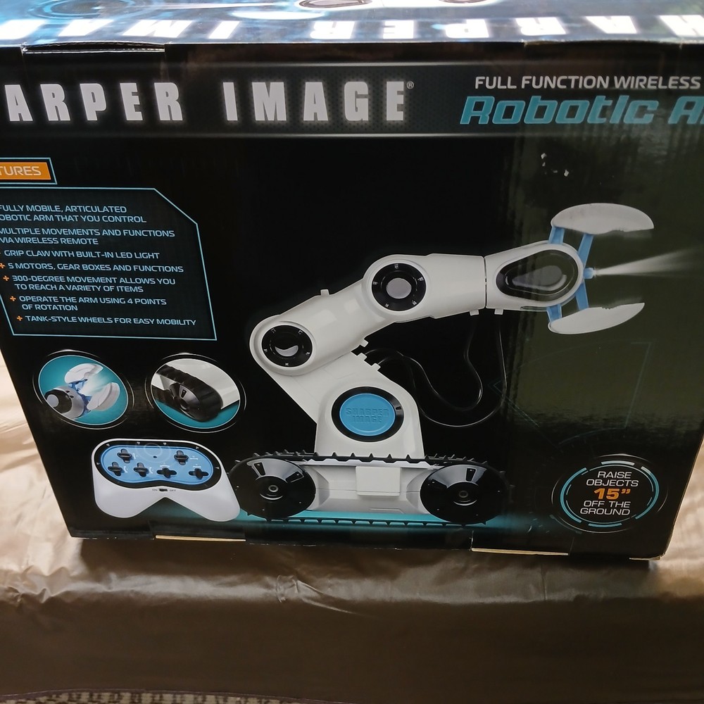 Sharper Image Remote Control Robotic Arm with Spotlight Claw Tank Tread Wheels