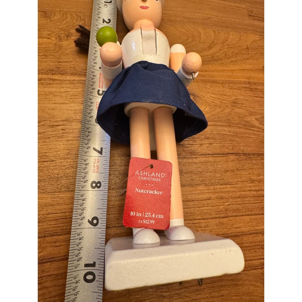 Tall tennis player girl nutcracker