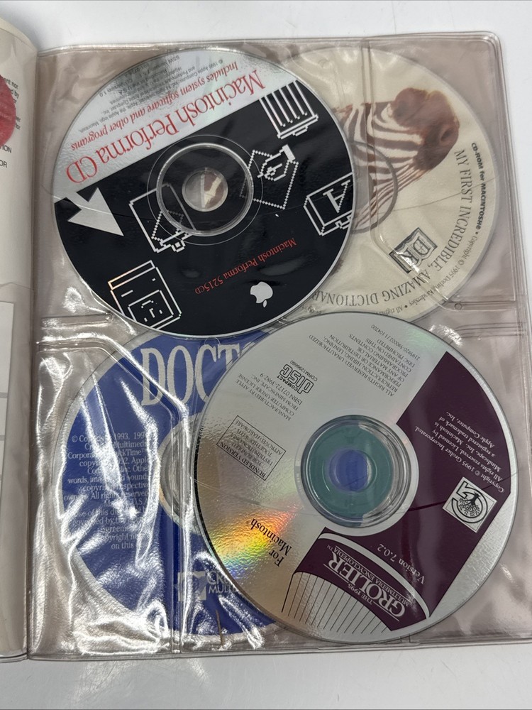 Vintage Macintosh 1990s CD-ROM Compact Discs Folder with 7 Discs