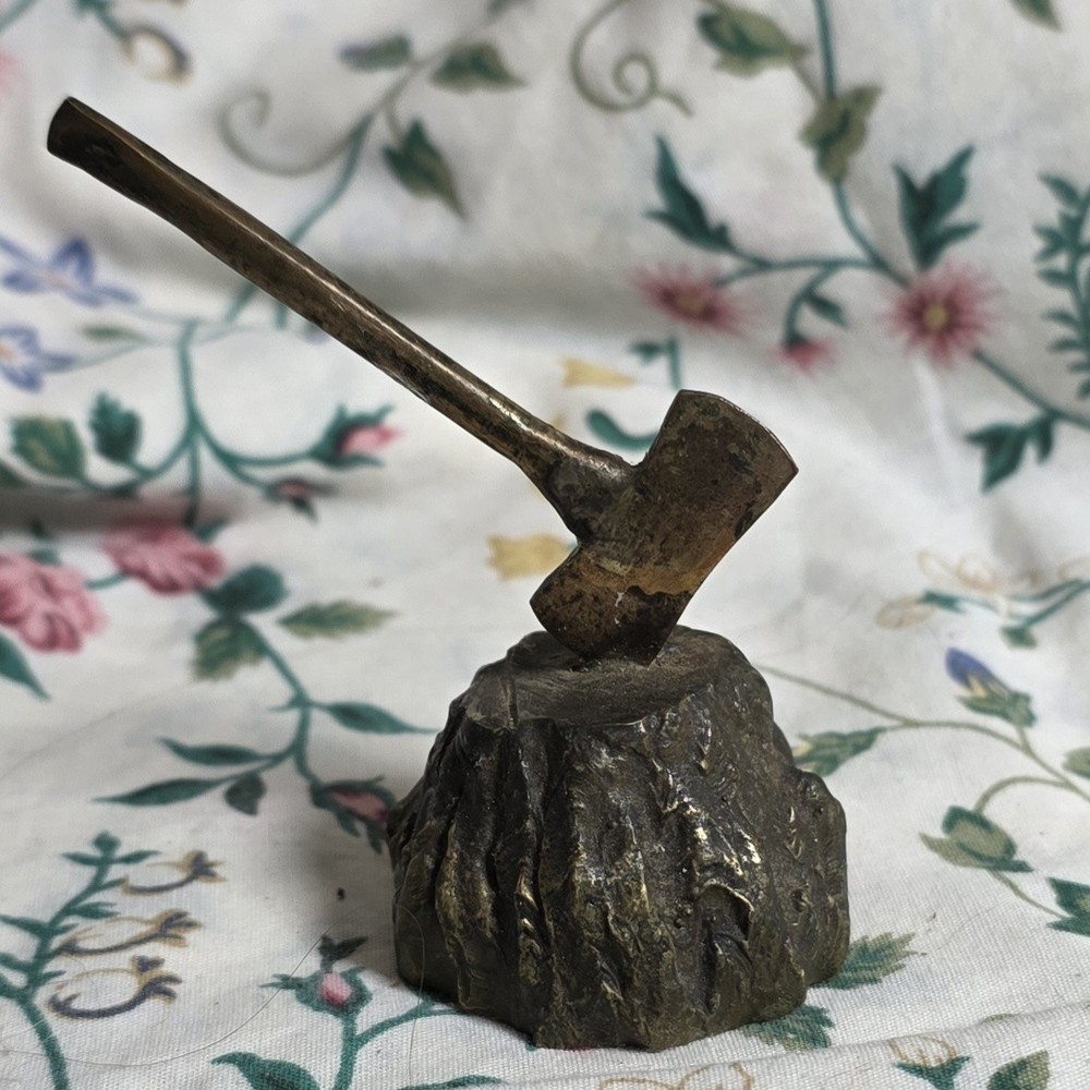 Brass Sculpture Of A Tree Stump And An Axe