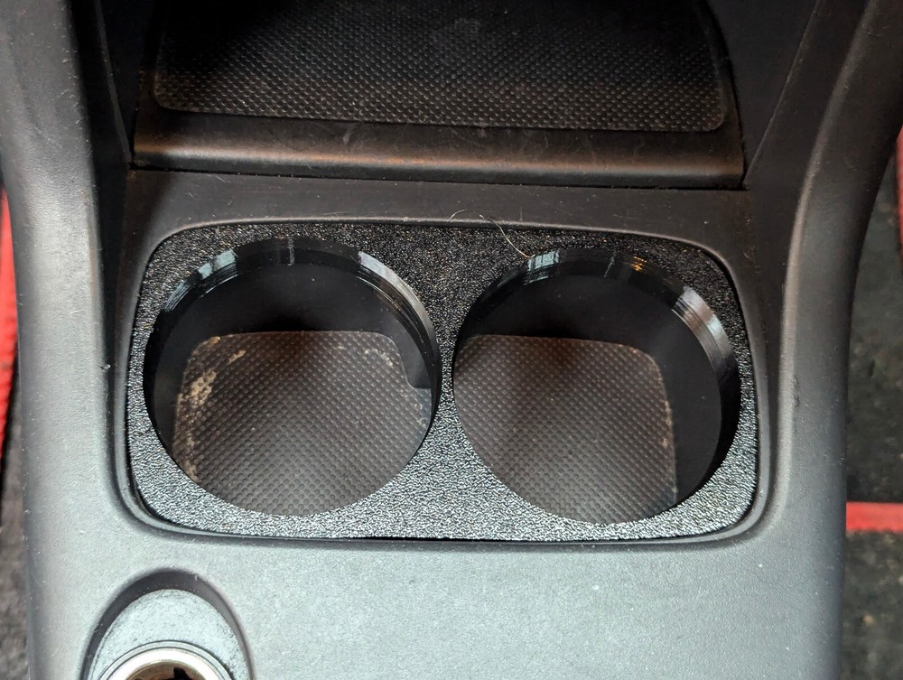 Cup holder insert for Suzuki Swift 2005-2010.