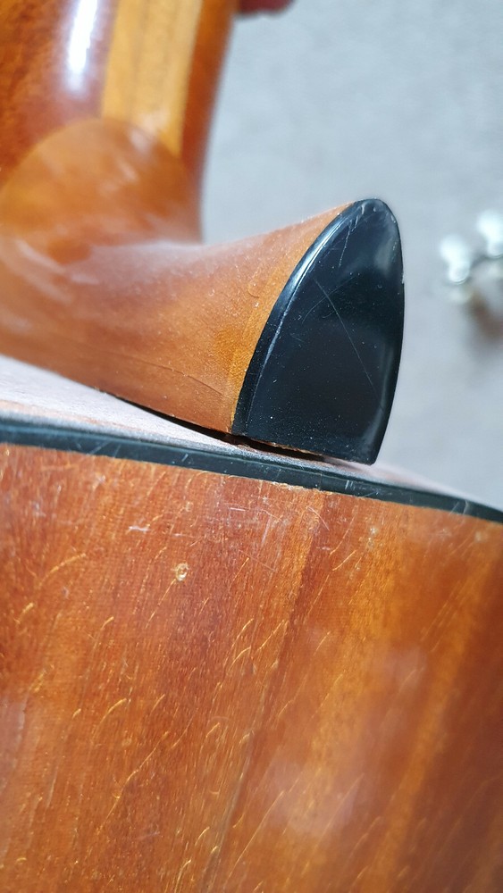 Old guitar with a nicely flamed back, needs service