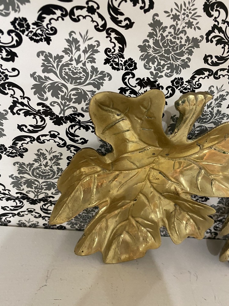 two beautiful solid brass leaf design wall decor. 7 inches tall.