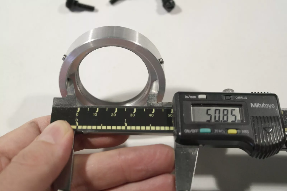 Custom T mount female adapter and lens holder for digiscoping microscopy