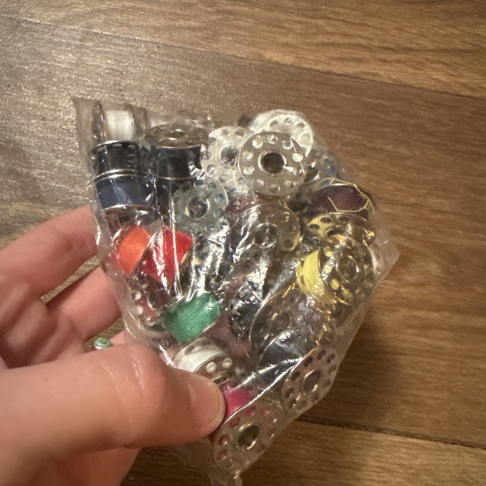 Lot Of Threaded Sewing Machine Bobbins