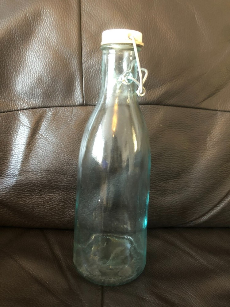 Vintage clear glass swing-top bottle