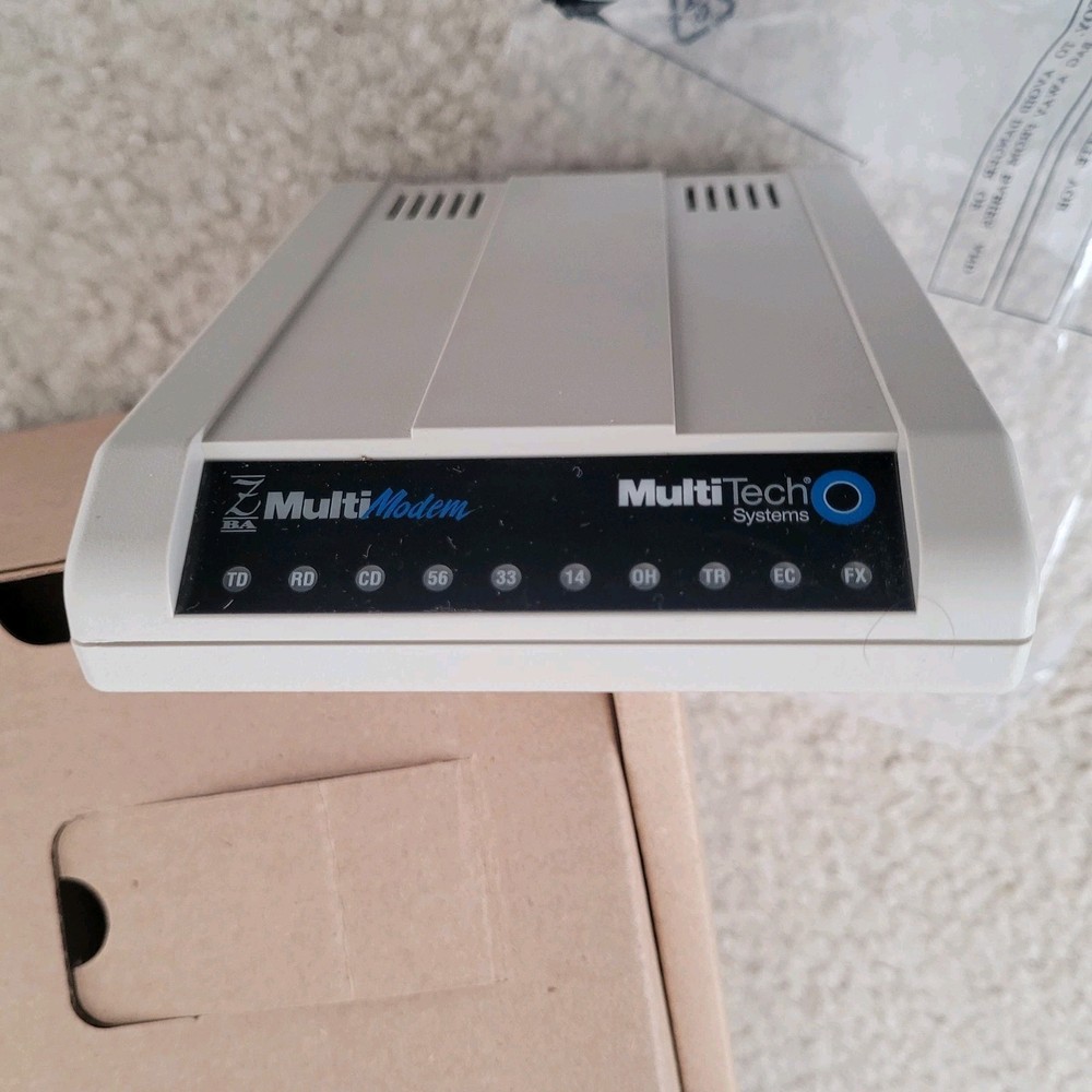 Multitech Systems Multi Modem Model: MT5634ZBA 56Kbps Data/Fax with accessories.