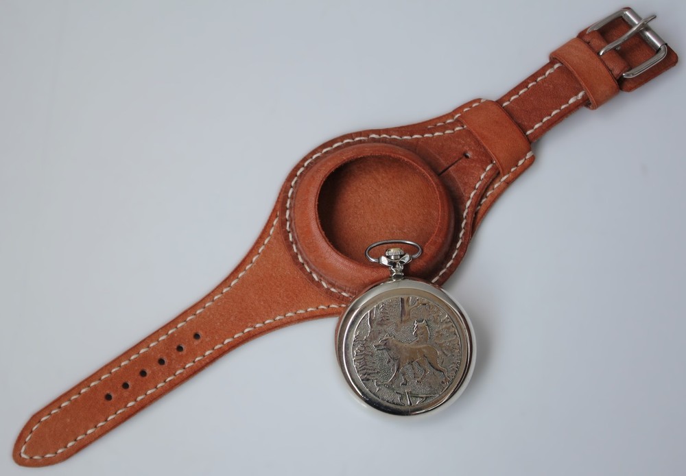 Molniya mechanical watch with a leather strap, wolves