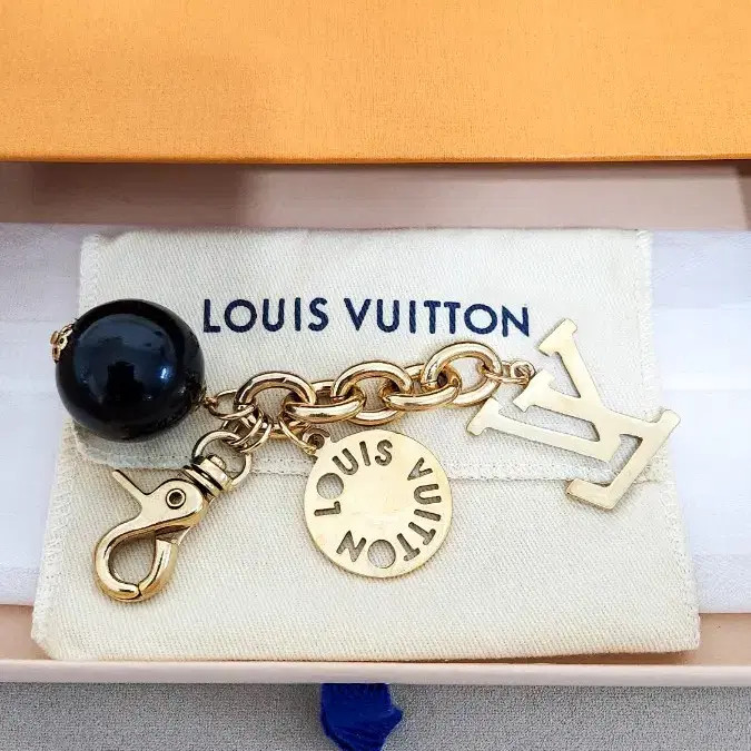 Louis Vuitton Gold LV Keyring - Authentic