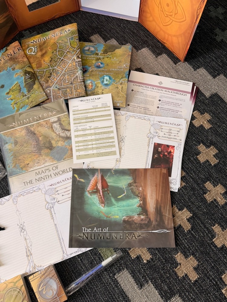 Numenera Reliquary Boxed Set (Kickstarter) and Q-Workshop Dice Sets
