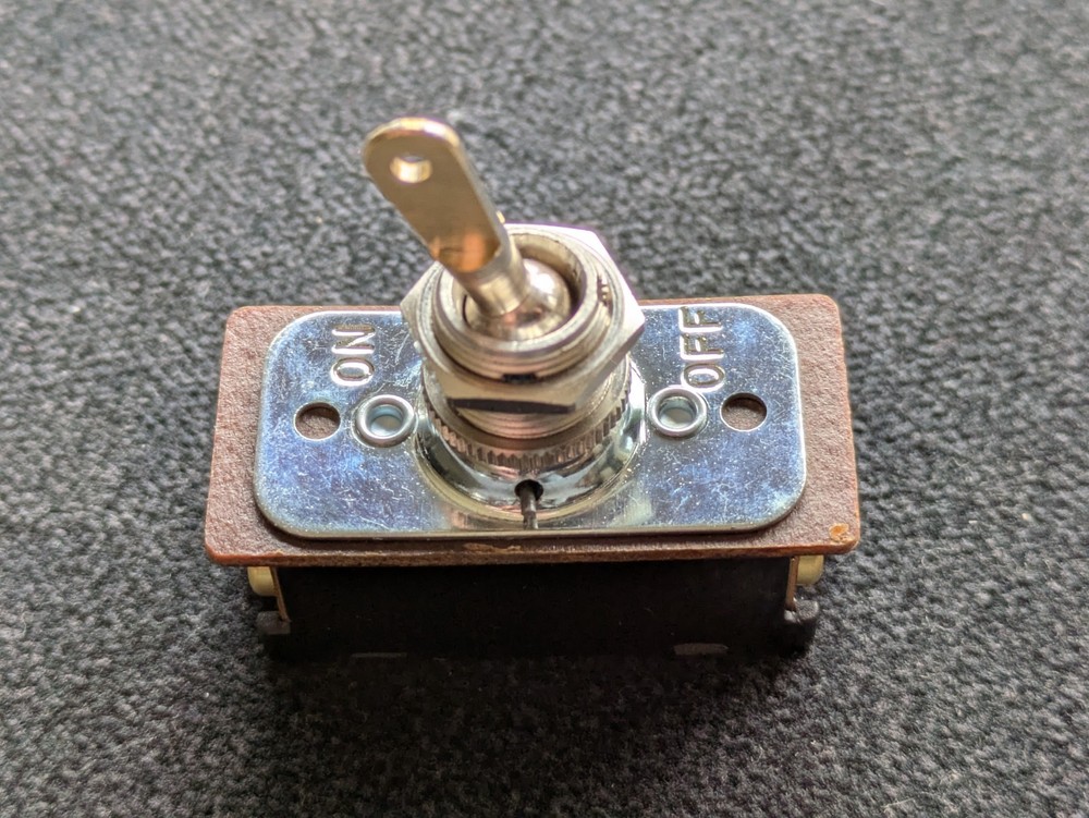 HEAVY DUTY DOUBLE POLE TOGGLE SWITCH - MACHINED WITH A FLAT BLADE HANDLE