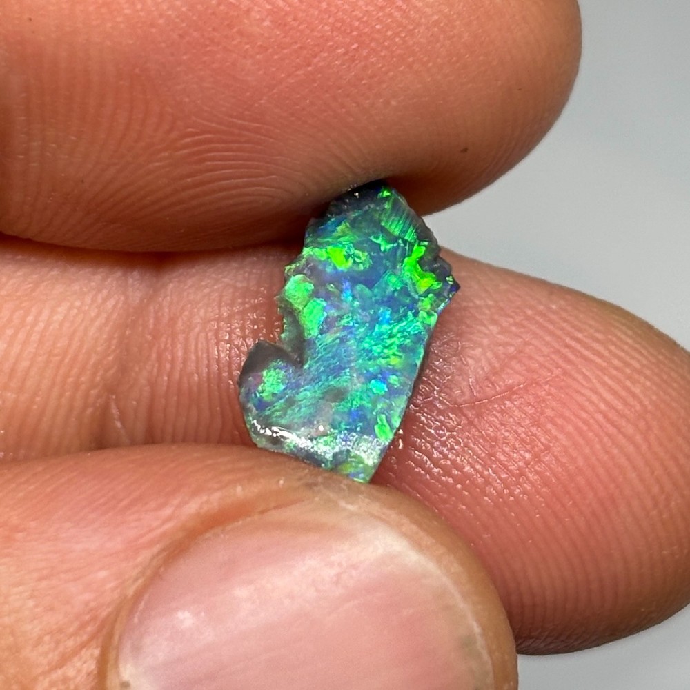 Astonishing Black Australian Lightning Ridge Rough Opal Rub