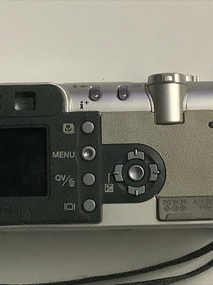 Minolta Konica DiMAGE F200 4.0MP Digital Camera - Silver - Powers On - Read
