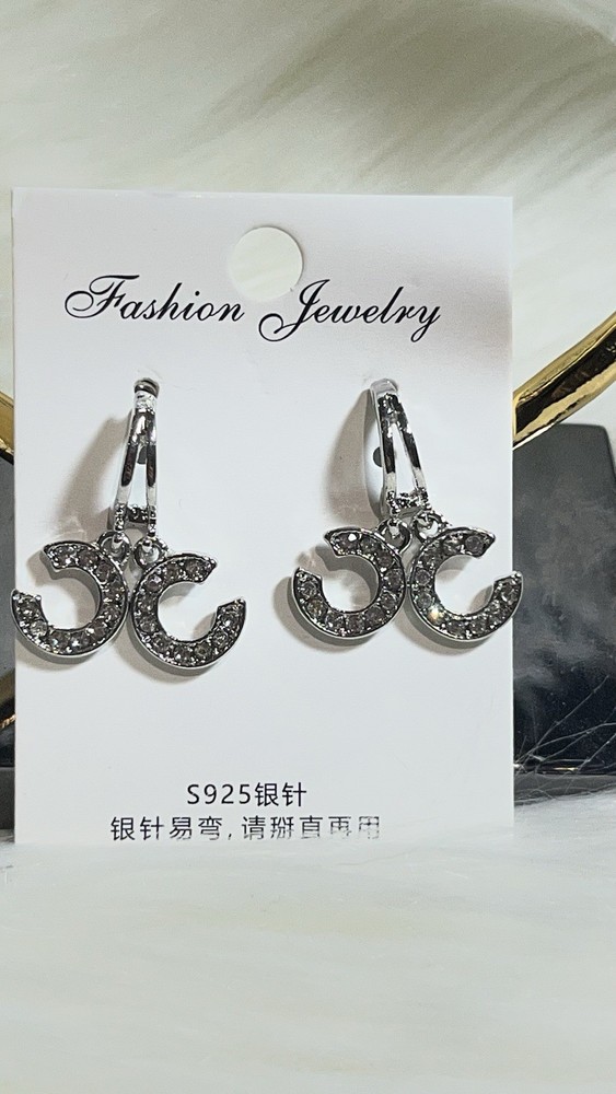 LUXURY STERLING SILVER EARRINGS .