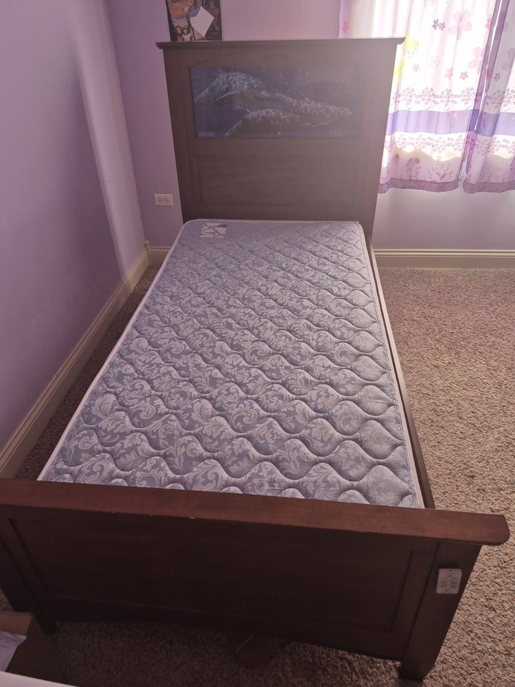 Wooden twin bed with remote controlled LED light