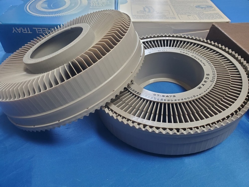 Two 1960's Montgomery Ward 100 Slide Wheel Trays 67-3473