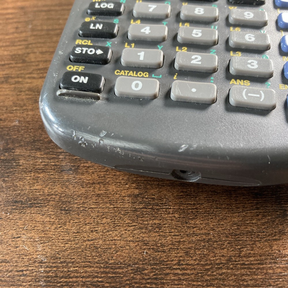 Texas Instruments TI-83 Handheld Graphing Calculator