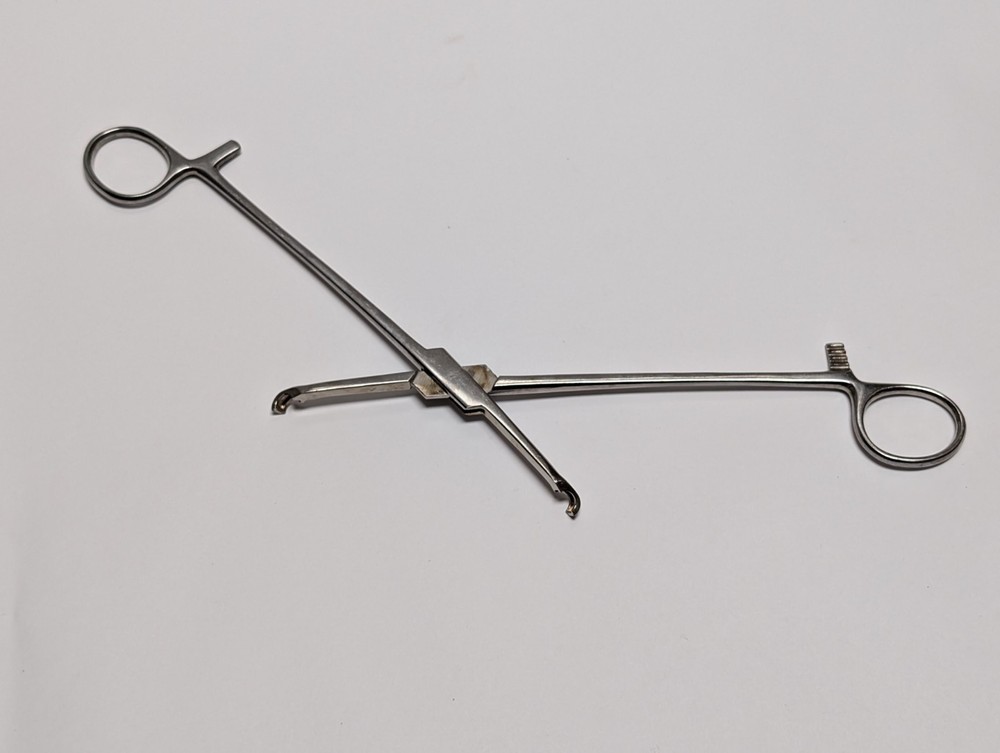 2 pcs. Screw Holding Forceps (USED).