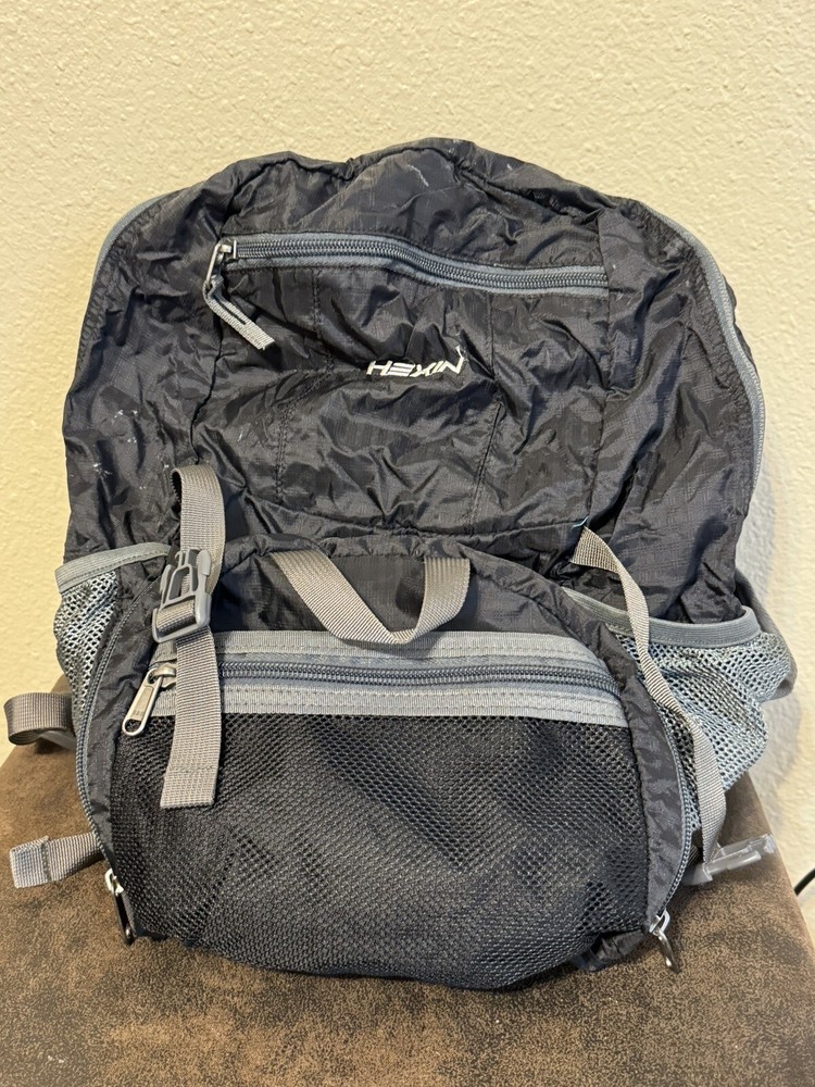 Hexin Foldable Backpack in Pouch “Field Operation 35L” Black/Silver EUC