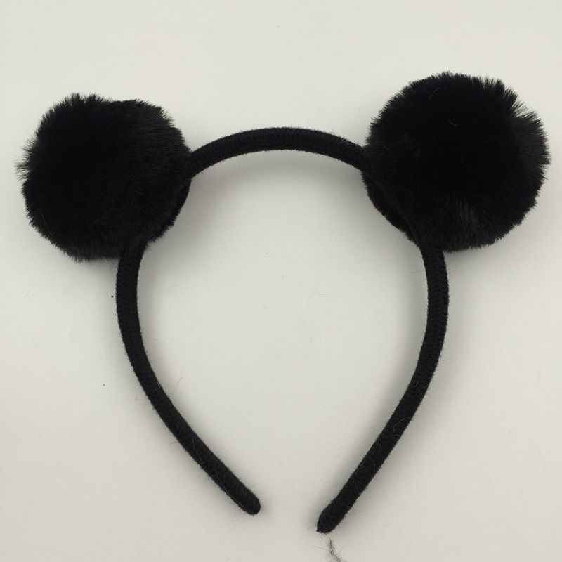 Furry pom pom headband