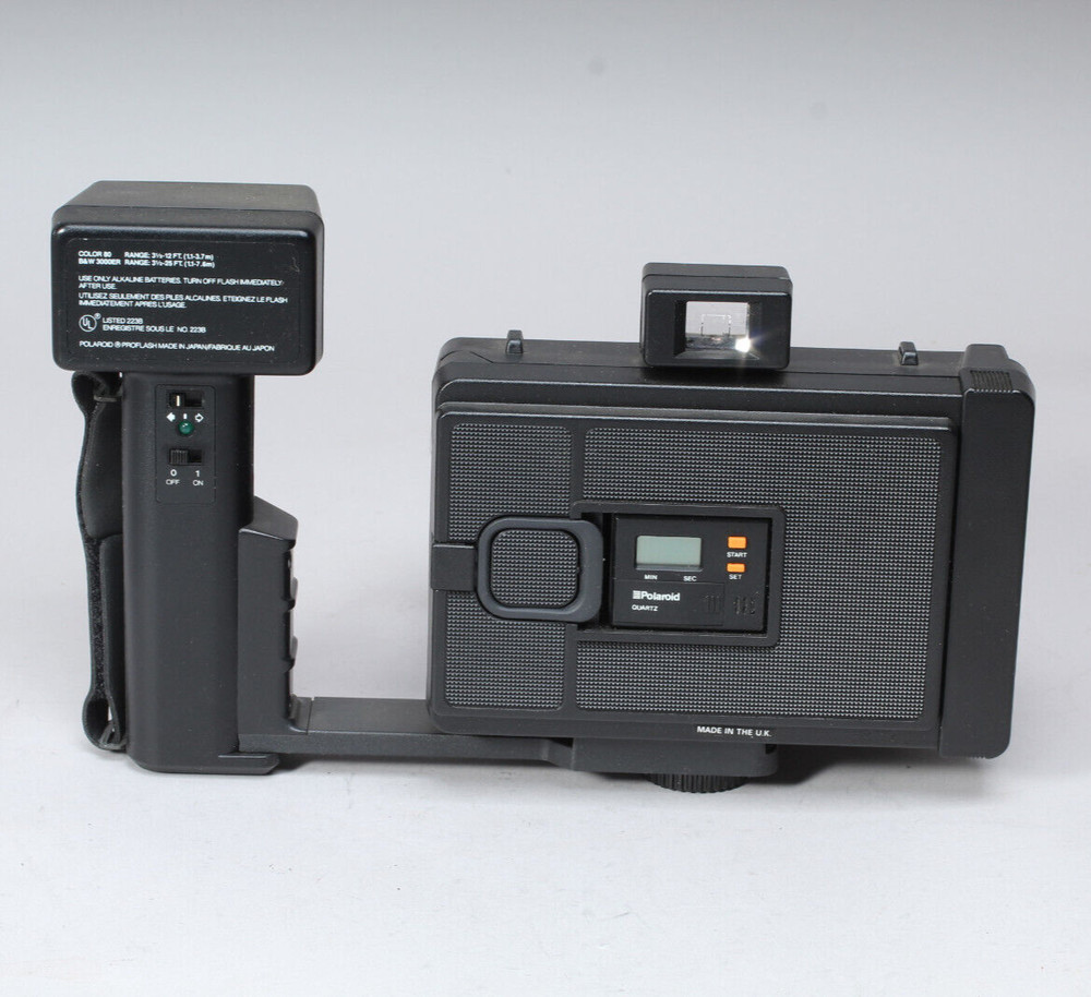 POLAROID PRO-PACK IN THE BOX W CAMERA FLASH STRAP & MANUALS FLASH BAD