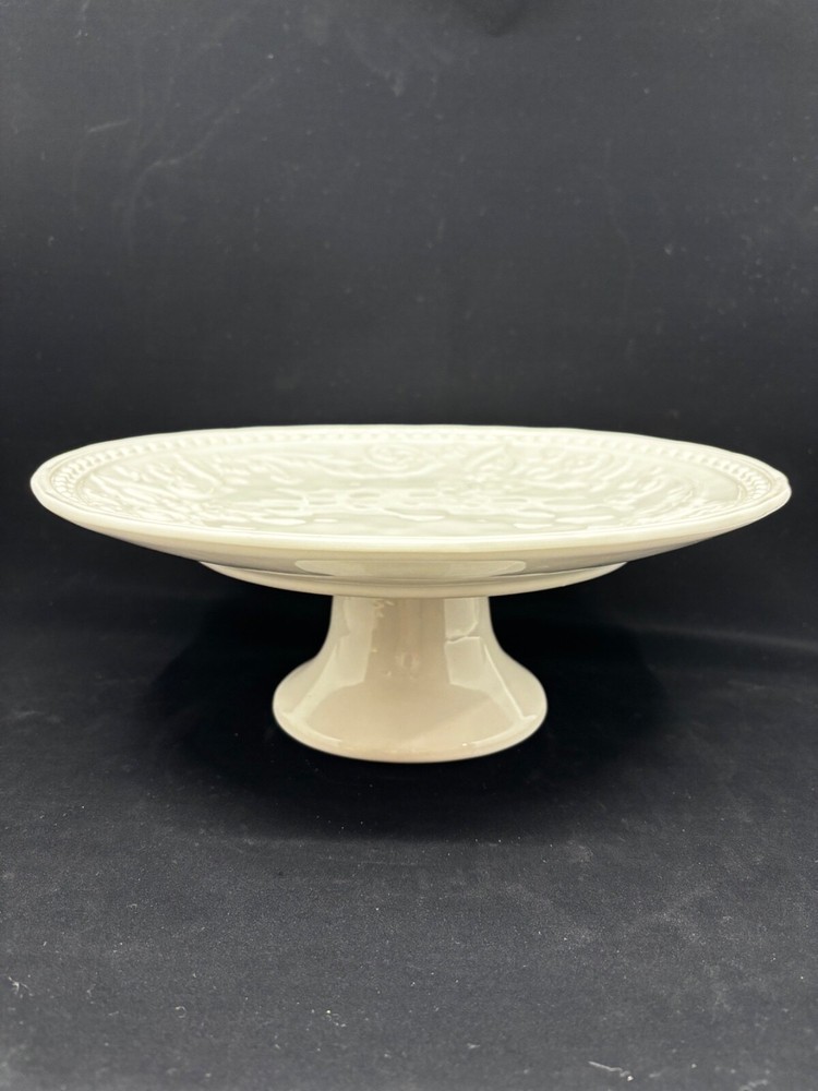 Large Pier 1 cake stand white with a floral pattern