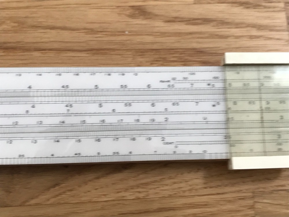 nice old good looking unique electrical slide rule in case