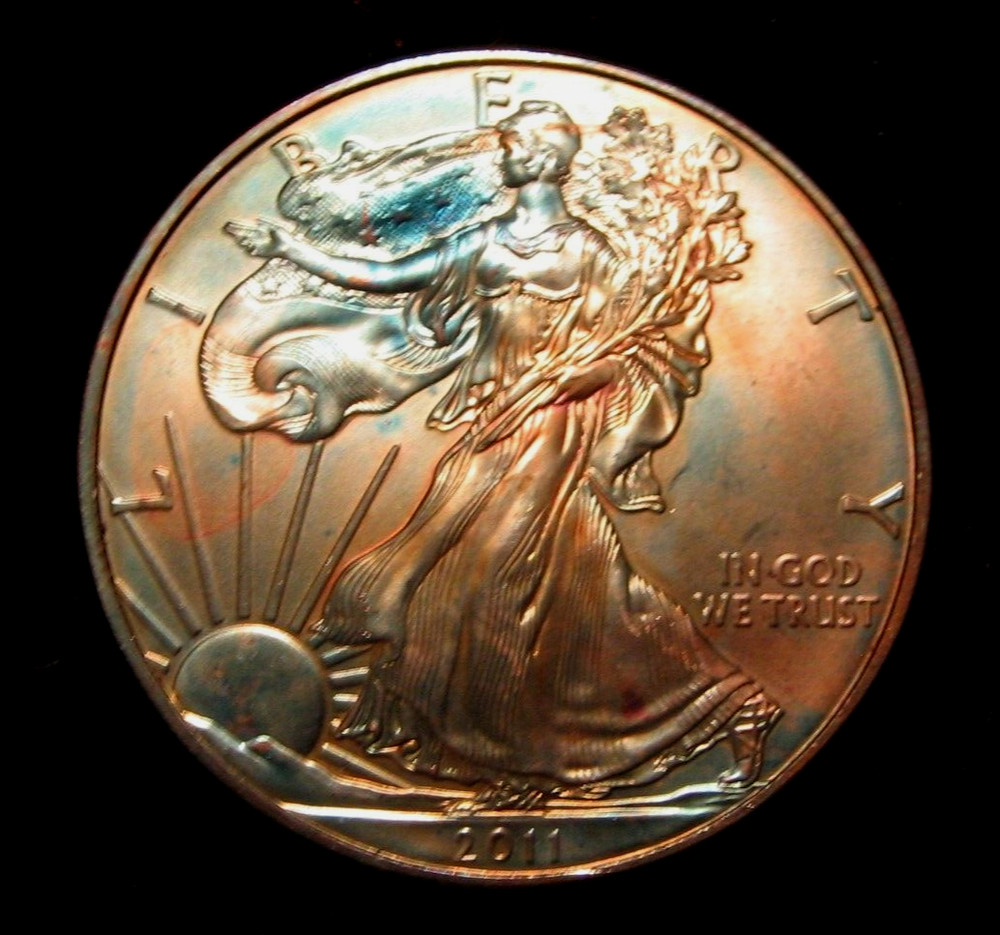 2011 AMERICAN SILVER EAGLE TONED AND UNCIRCULATED  ( GREAT GIFT)
