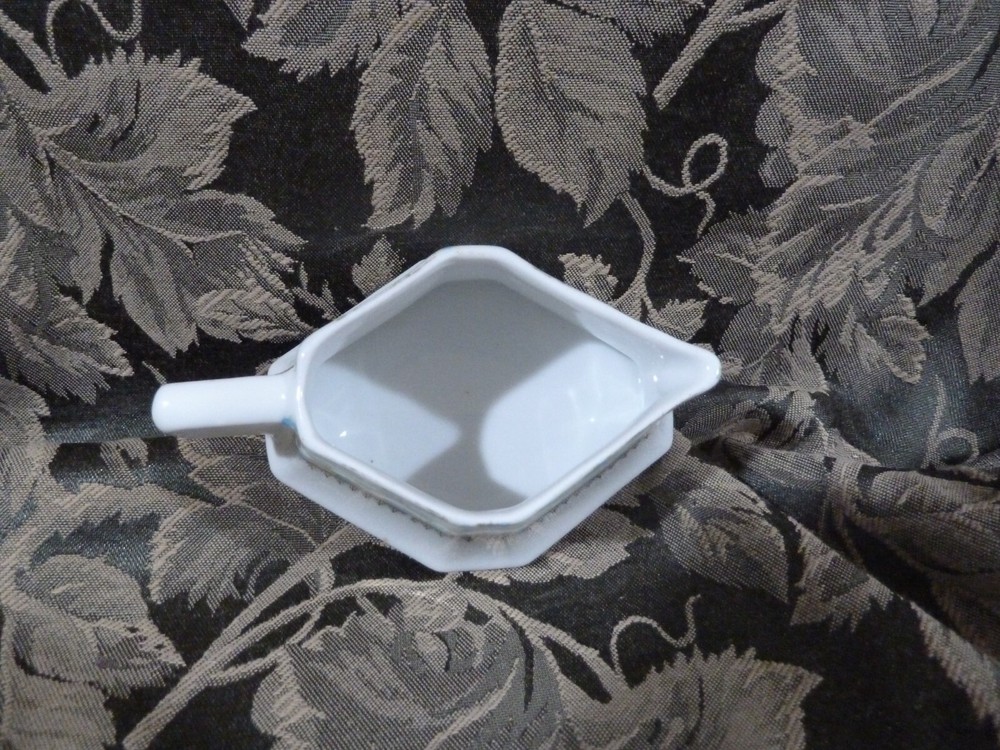 German Creamer with Blue Floral Design