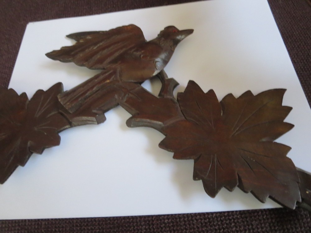 Old Cuckoo clock with articulated bird