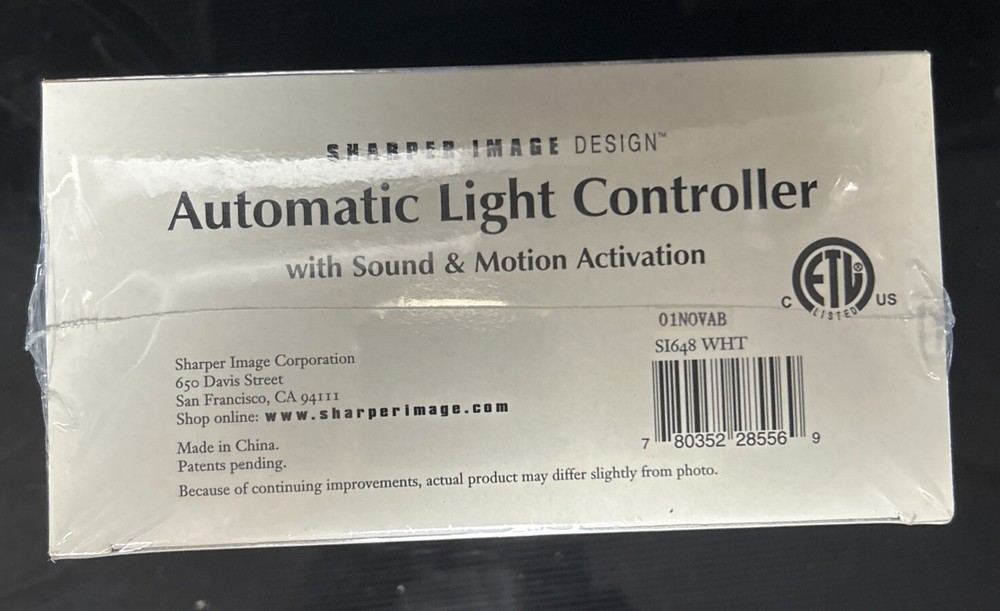 BRAND NEW SEALED Sharper Image Automatic Light Controller Sound & Motion Si648