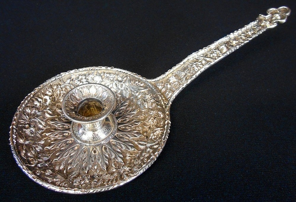 A rare repousse solid silver chamberstick, 11oz mark, S.Kirk & Son c.1886-96