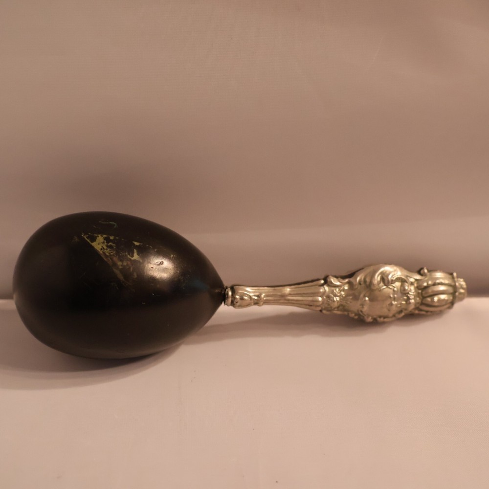 Darner with silver handle