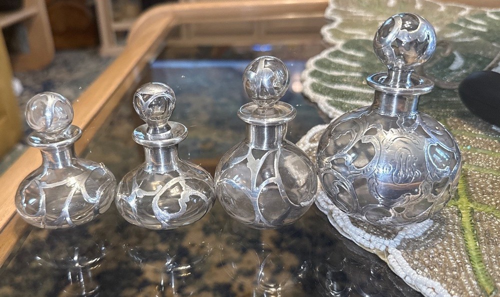 Circa 1905 elegant .999 fine solid silver lined aroma bottle set made by leading