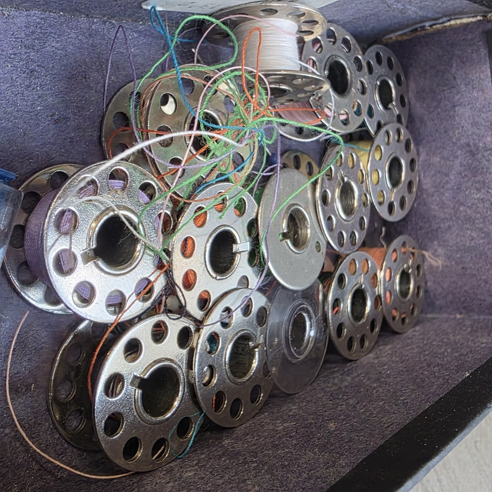 vintage sewing machine bobbins Assorted & Needles