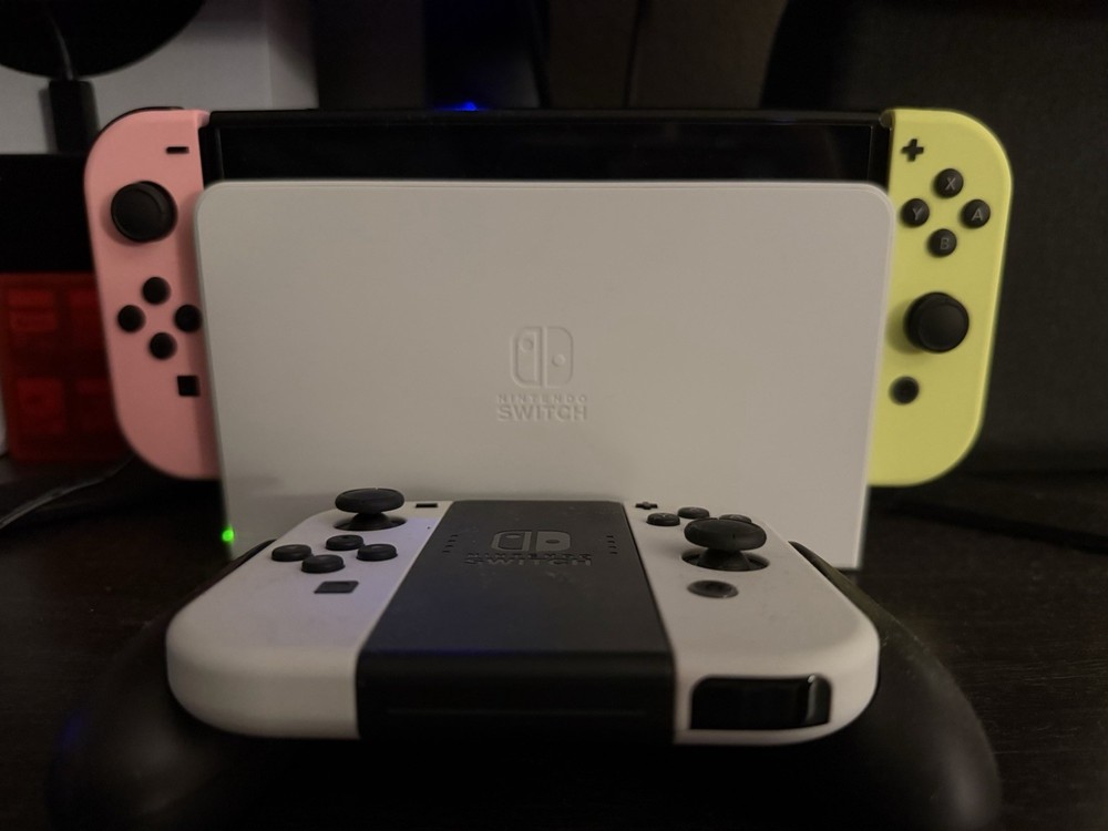 Nintendo Switch OLED Console Bundle with Joy-Con, Straps, Game Cartridges, Case