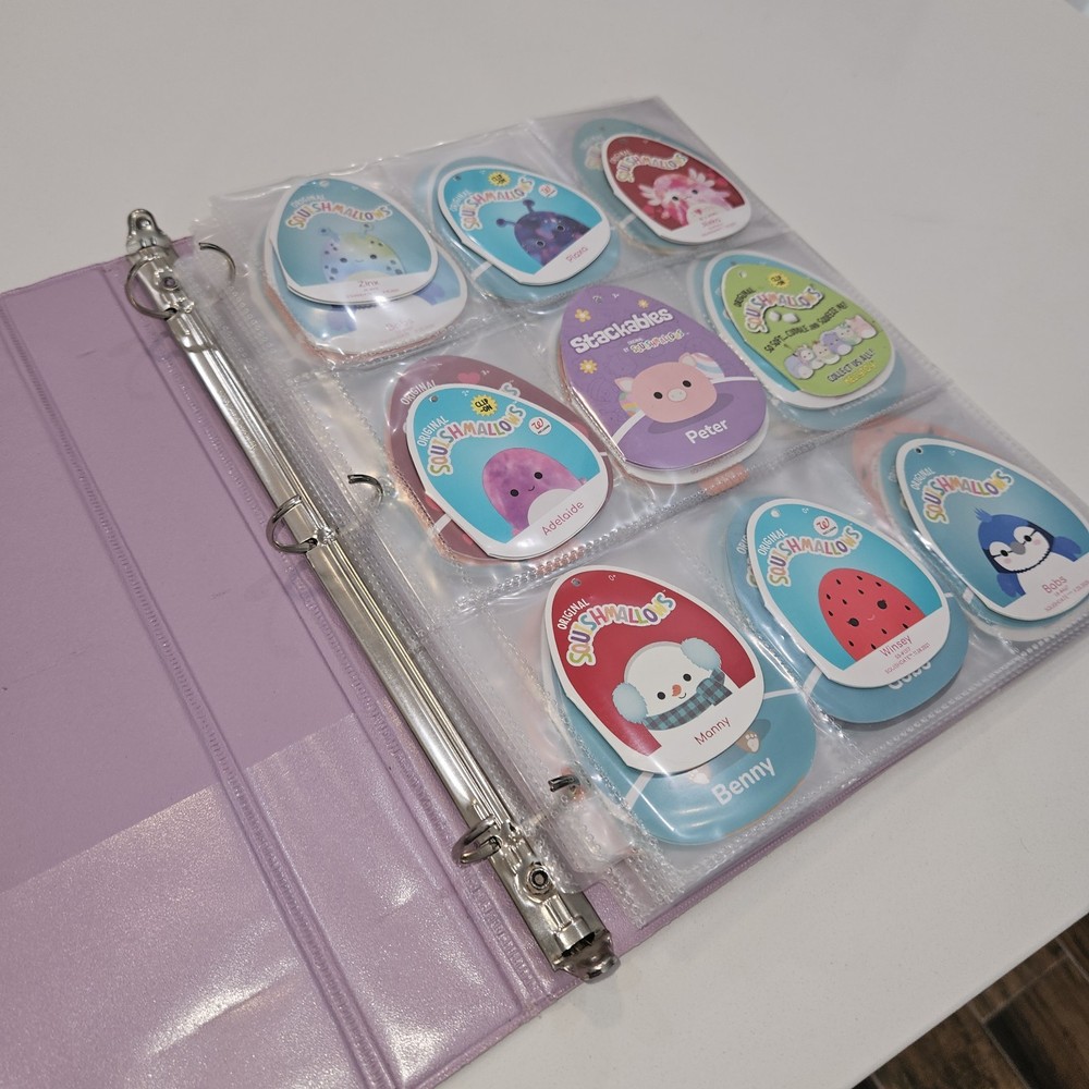 71 Squishmellow Tags In Binder. TAGS ONLY
